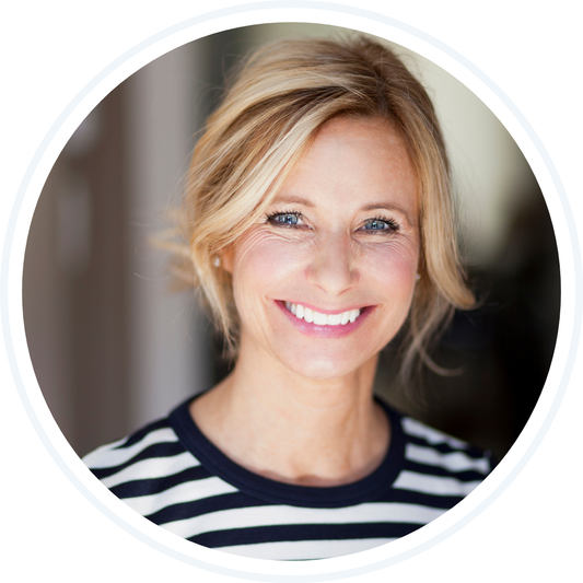 Smiling blonde woman with striped shirt